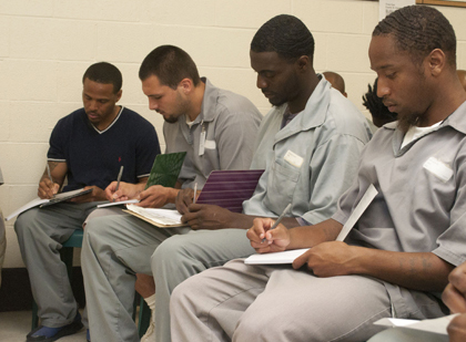Missouri Eastern Correctional Center (MECC) inmates enrolled in ARCHS' Second Chance Act Mentoring Program write out their thoughts and goals during a recent journaling class.